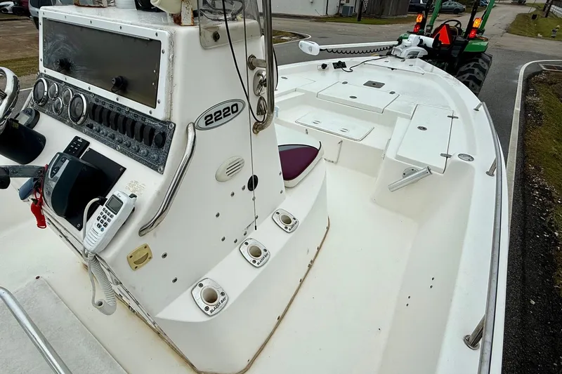 Slide: The Image of 2003 Blazer 2220 Bay boat interior with control panel and seating. - 13