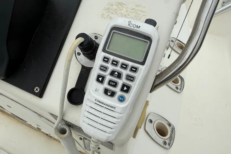 Slide: The Image of ICOM marine radio on 2003 Blazer 2220 Bay boat console. - 17
