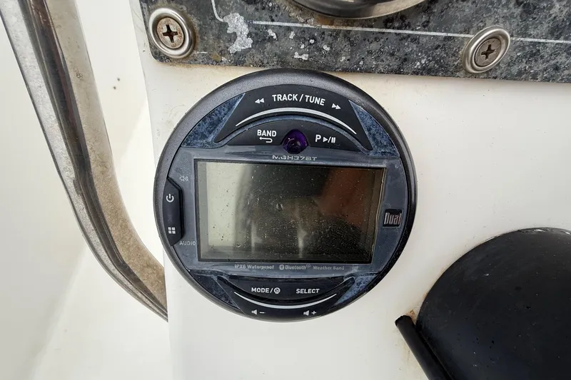 Slide: The Image of Boat stereo system on a 2003 Blazer 2220 Bay, featuring track and tune controls. - 19