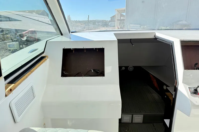 Slide: The Image of 2021 Gulf Crosser 44 interior cockpit with empty dashboard space. - 21