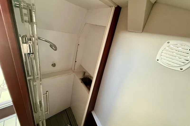 Slide: The Image of 2021 Gulf Crosser 44 yacht bathroom with shower and sink. - 28