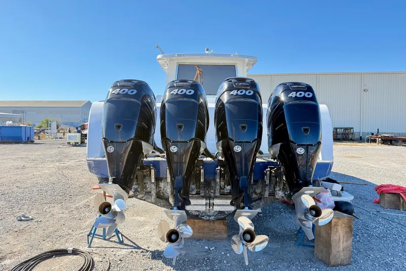 Slide: The Image of Four powerful outboard motors on a 2021 Gulf Crosser 44 boat. - 3