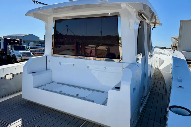 Slide: The Image of 2021 Gulf Crosser 44 boat with sleek design and spacious deck area. - 34