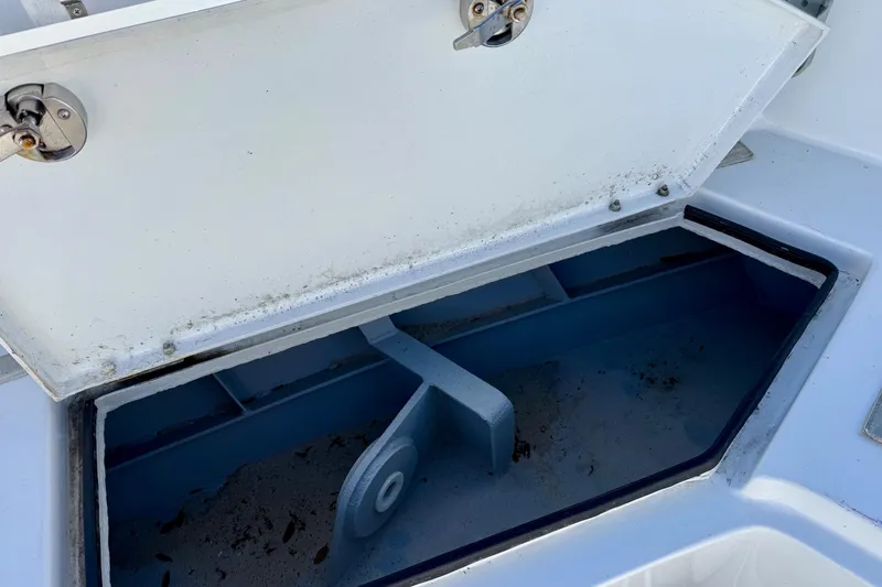 Slide: The Image of Open storage compartment on a 2021 Gulf Crosser 44 boat. - 37