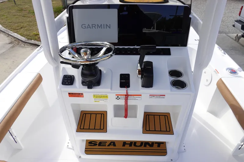 Slide: The Image of 2026 Sea Hunt BX 22 BR boat console with Garmin display and steering wheel. - 18