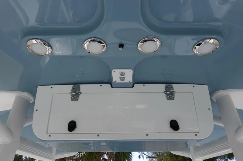 Slide: The Image of 2026 Sea Hunt BX 22 BR boat console with blue finish and mounted lights. - 23
