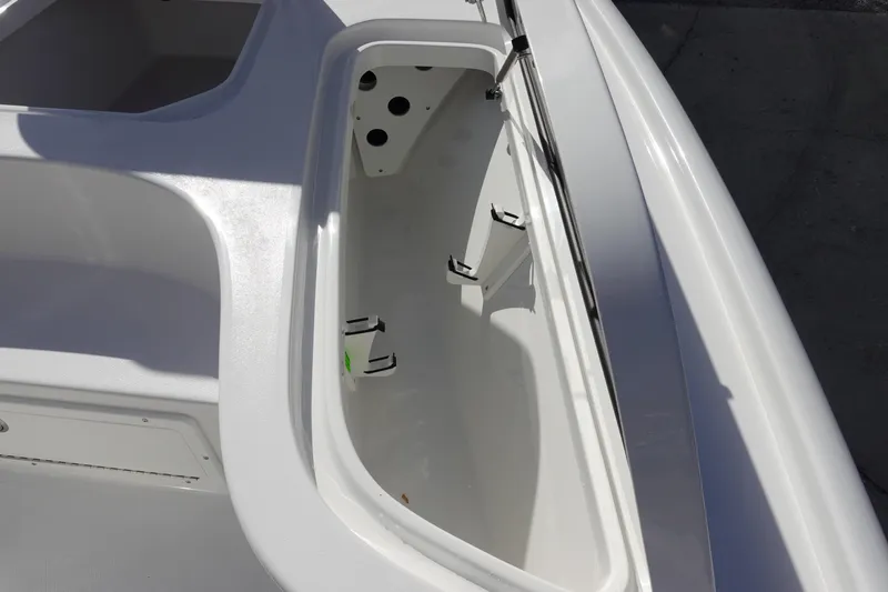 Slide: The Image of 2026 Sea Hunt BX 22 BR boat storage compartment, open and empty, showcasing interior design. - 30
