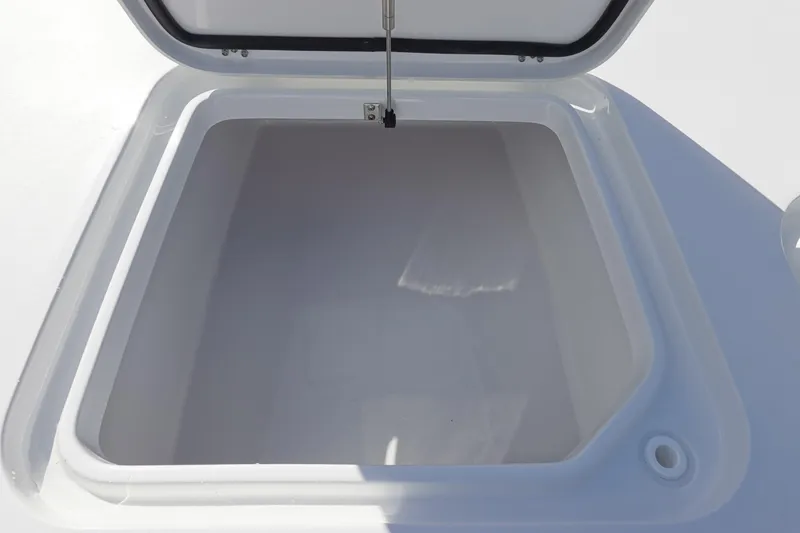 Slide: The Image of Open storage compartment on 2026 Sea Hunt BX 22 BR boat. - 31