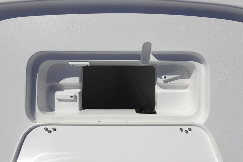 Slide: The Image of 2026 Sea Hunt BX 22 BR boat storage compartment with sleek design and secure fittings. - 33