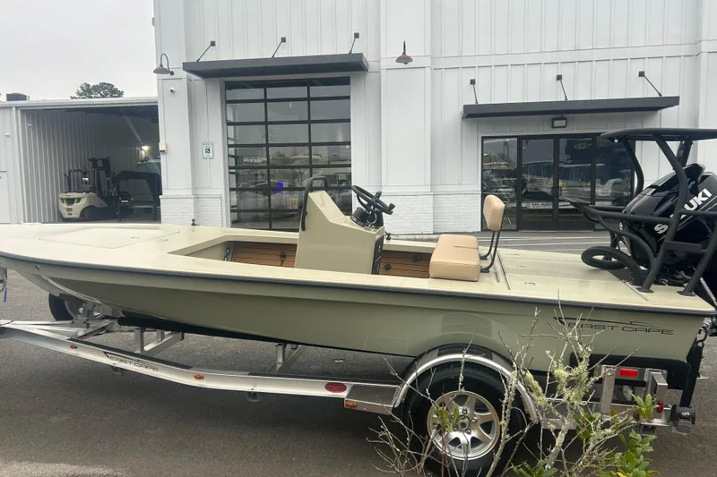 Slide: The Image of 2026 East Cape EVO 18V boat logo on sleek hull design. - 5
