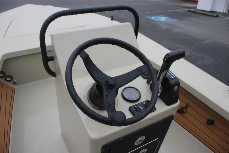 Slide: The Image of Steering console of 2026 East Cape EVO 18V boat with wet controls and gauge. - 10