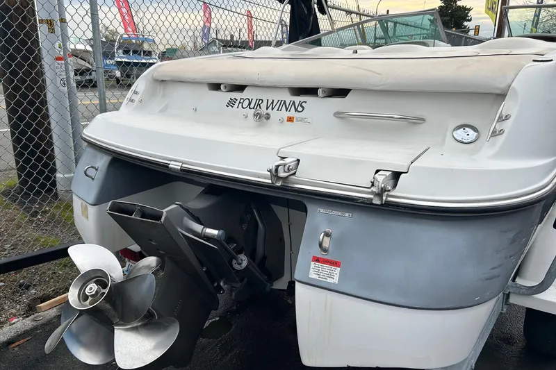 Slide: The Image of Rear view of a 2000 Four Winns 200 Horizon boat with propeller. - 18