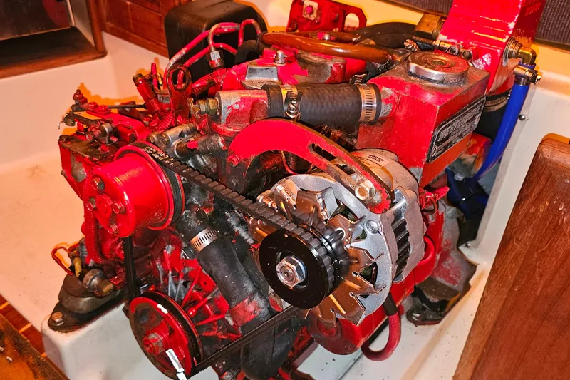 Slide: The Image of Red Tartan 3100 engine from 1994, showcasing detailed mechanical components. - 22