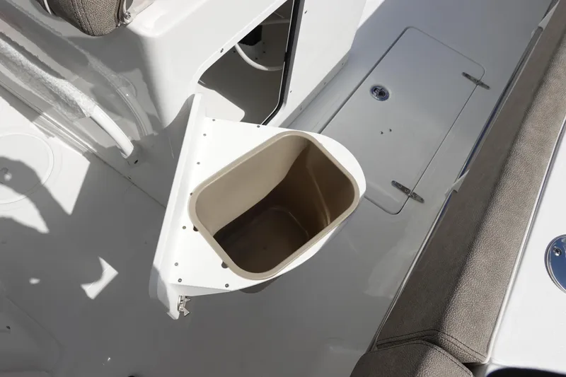 Slide: The Image of 2026 Sea Hunt Gamefish 30 Coffin Box interior with storage compartment and seating. - 19