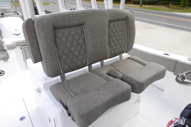 Slide: The Image of 2026 Sea Hunt Gamefish 30 Coffin Box boat seating with diamond-stitched upholstery. - 25