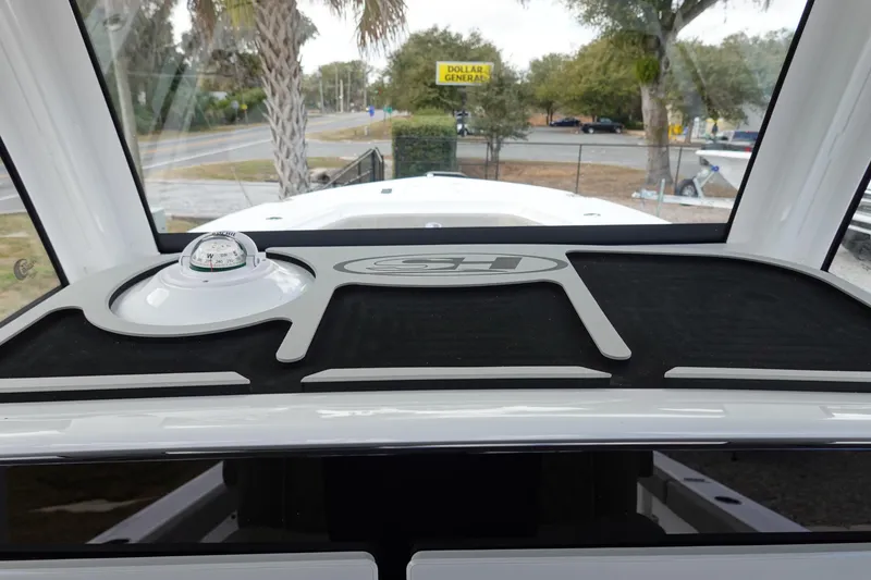 Slide: The Image of 2026 Sea Hunt Gamefish 30 Coffin Box dashboard with compass and logo. - 28