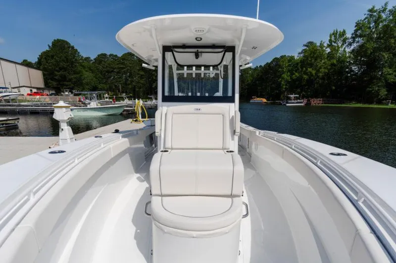 Slide: The Image of 2026 Sea Hunt Gamefish 30 Coffin Box boat on trailer, front view. - 3