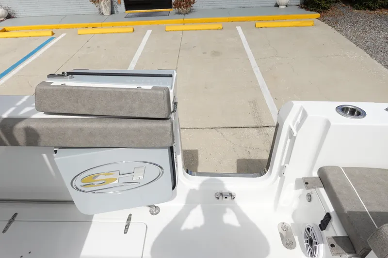 Slide: The Image of 2026 Sea Hunt Gamefish 30 Coffin Box boat interior with seating and cup holder. - 40