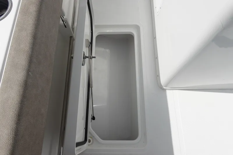 Slide: The Image of Open storage compartment on 2026 Sea Hunt Gamefish 30 Coffin Box boat. - 41