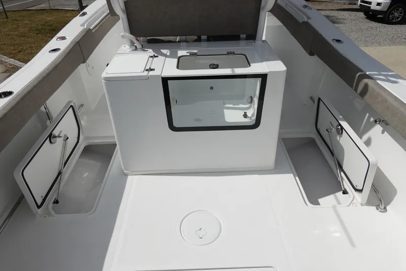 Slide: The Image of 2026 Sea Hunt Gamefish 30 Coffin Box interior with storage compartments and seating. - 43