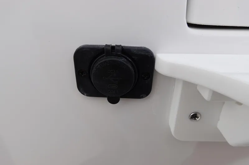 Slide: The Image of 2026 Sea Hunt Gamefish 30 Coffin Box, close-up of a flush water outlet. - 45