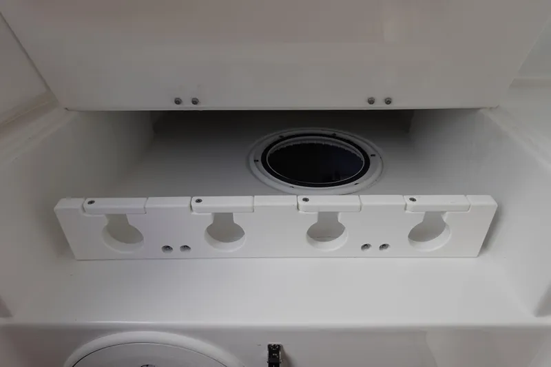 Slide: The Image of 2026 Sea Hunt Gamefish 30 Coffin Box interior with rod holders and storage compartment. - 48