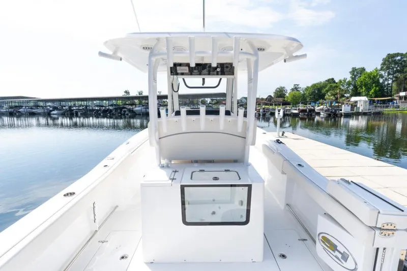 Slide: The Image of 2026 Sea Hunt Gamefish 30 Coffin Box boat ladder and motor detail. - 7