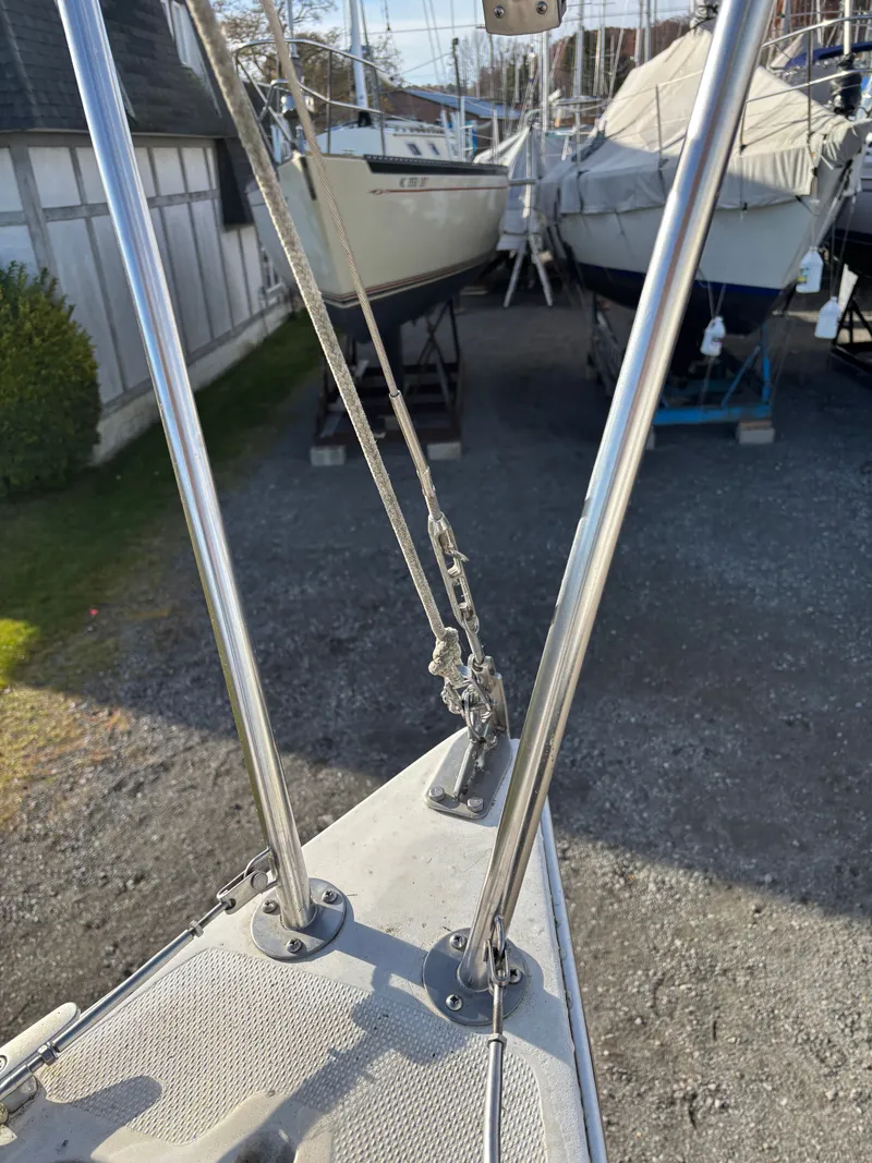 Slide: The Image of Bow of a 1986 Catalina 25 sailboat in dry dock. - 16