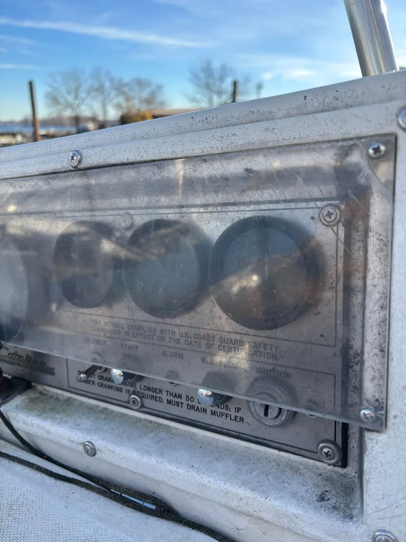 Slide: The Image of Dashboard of a 1986 Catalina 25 boat with instruments. - 34