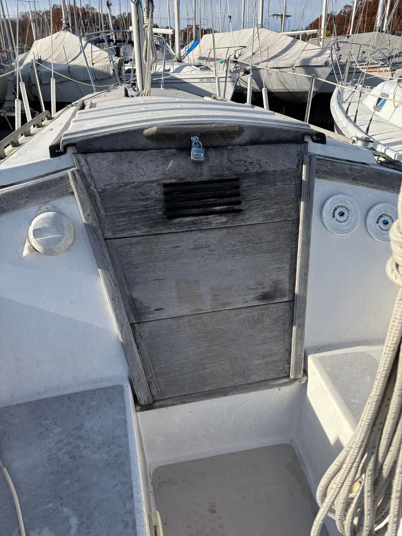 Slide: The Image of Cockpit of a 1986 Catalina 25 sailboat in harbor. - 37