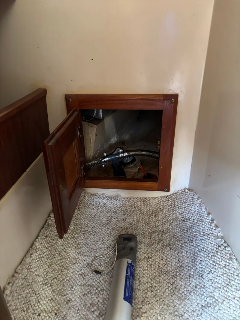 Slide: The Image of Interior of 1986 Catalina 25 with open maintenance hatch. - 45