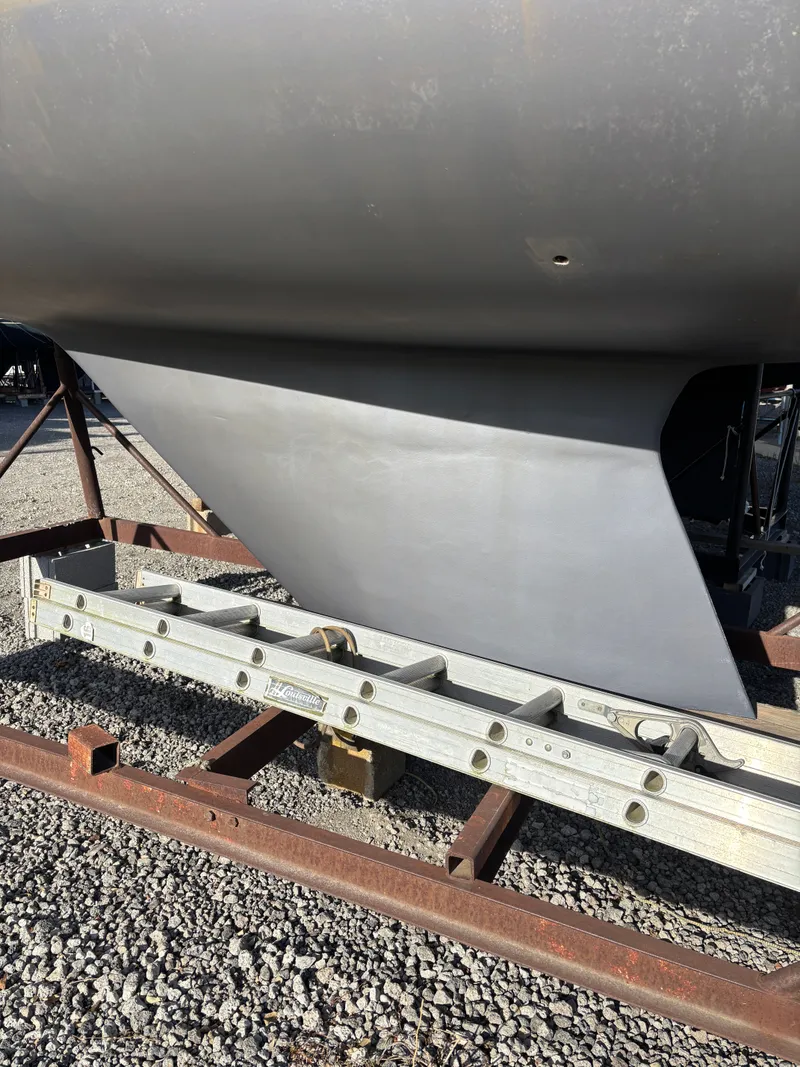 Slide: The Image of Keel of a 1986 Catalina 25 sailboat on a stand. - 7