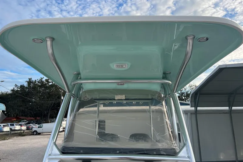 Slide: The Image of 2026 Key West 263 FS boat with sleek T-top design and clear windshield. - 30