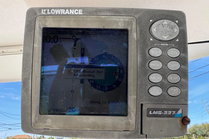 Slide: The Image of Lowrance LMS-337 GPS display showing error on 2006 Mako 253 Walk Around boat. - 14