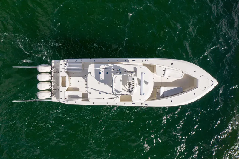 Slide: The Image of Overhead view of 2017 SeaVee 390Z boat on green water. - 3