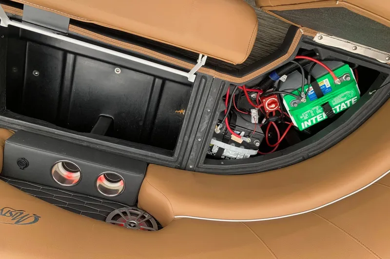 Slide: The Image of Misty Harbor Elite E3U 2020 boat interior showing battery compartment and wiring. - 18