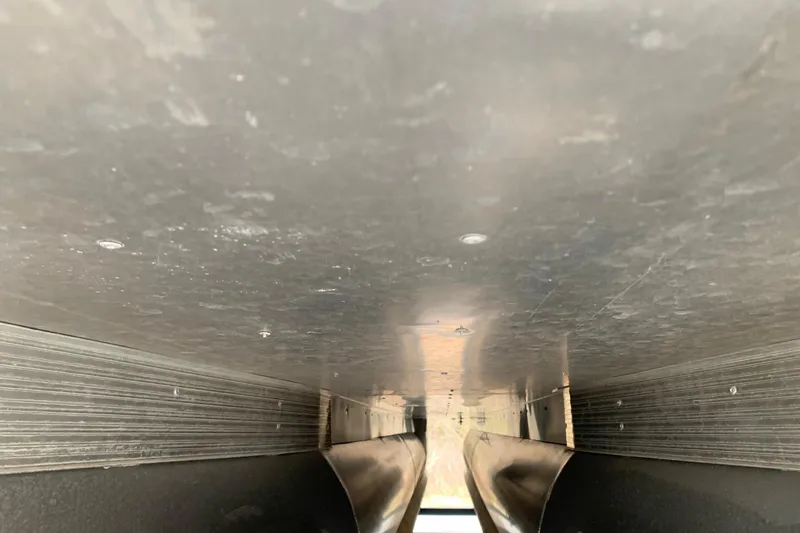 Slide: The Image of Underneath view of a 2020 Misty Harbor Elite E3U pontoon boat. - 24
