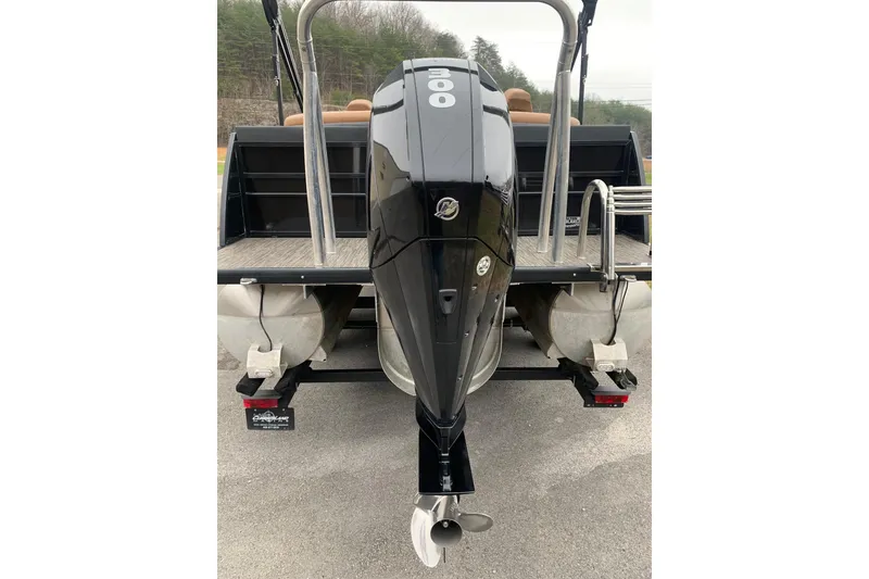 Slide: The Image of 2020 Misty Harbor Elite E3U pontoon boat with powerful outboard motor. - 3