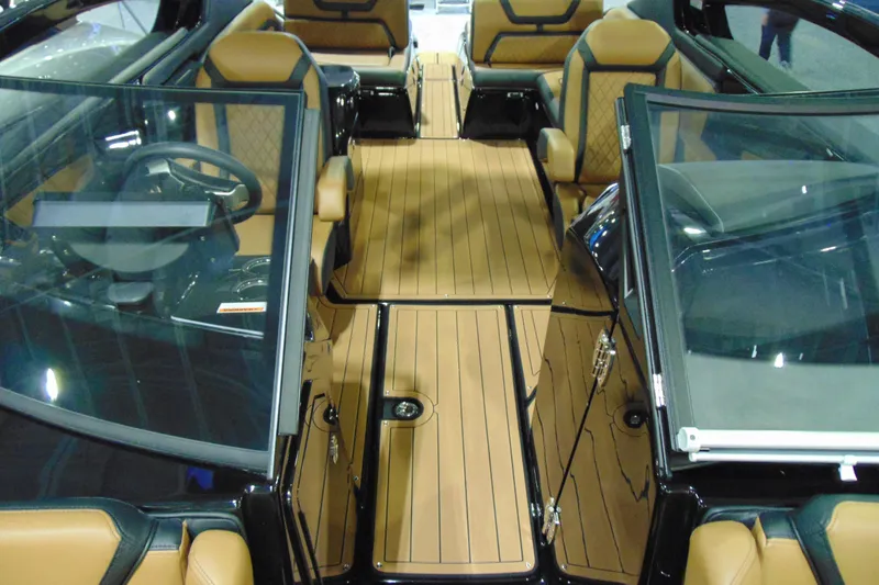 Slide: The Image of Interior view of 2026 Yamaha Boats 275SD, featuring luxurious seating and sleek design. - 15