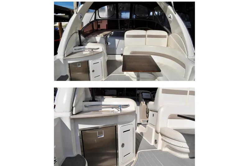 Slide: The Image of 2004 Sea Ray 320 Sundancer interior with seating and table, docked by the water. - 6