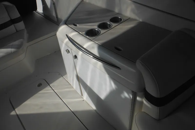Slide: The Image of Interior of 2003 Formula 280 Bowrider boat with cup holders and seating. - 13
