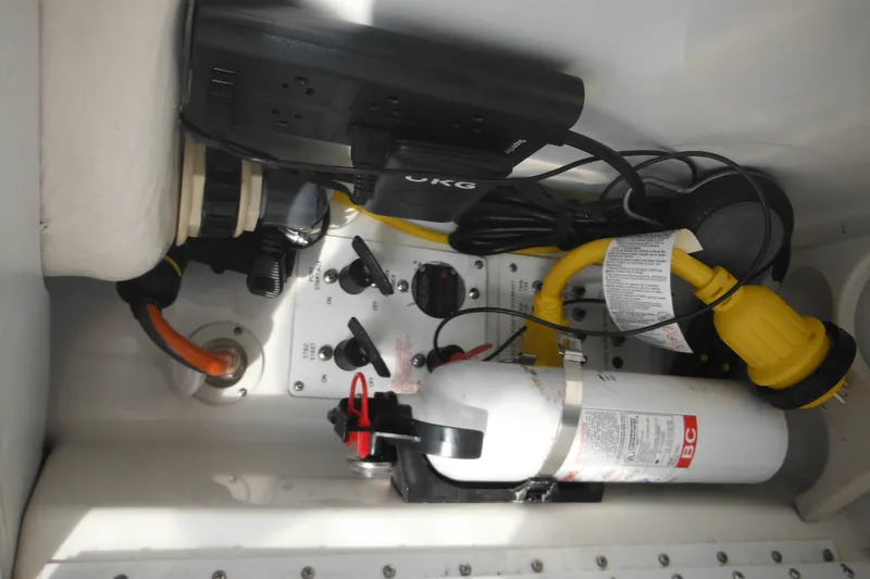 Slide: The Image of Electrical panel and fire extinguisher in 2003 Formula 280 Bowrider boat. - 17