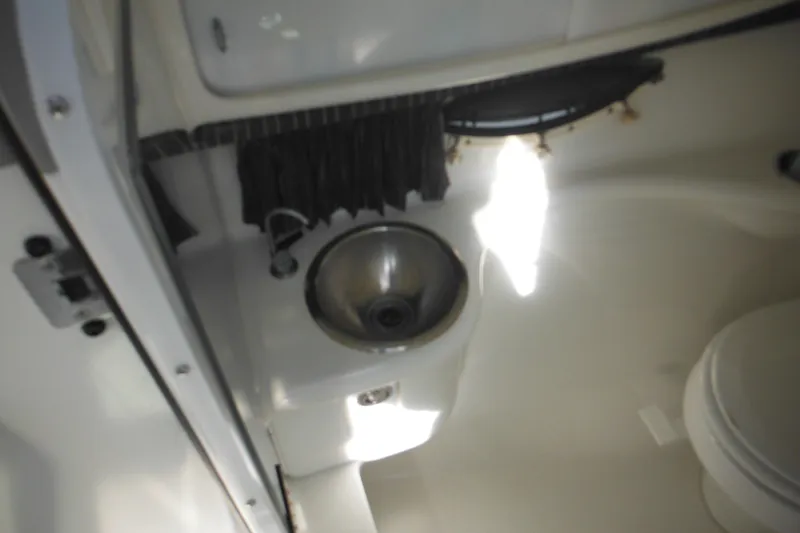 Slide: The Image of 2003 Formula 280 Bowrider interior with sink and toilet. - 25