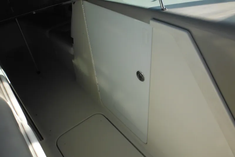 Slide: The Image of 2003 Formula 280 Bowrider interior detail, featuring a storage compartment. - 26