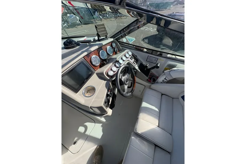 Slide: The Image of 2003 Formula 280 Bowrider cockpit with steering wheel and instrument panel. - 53