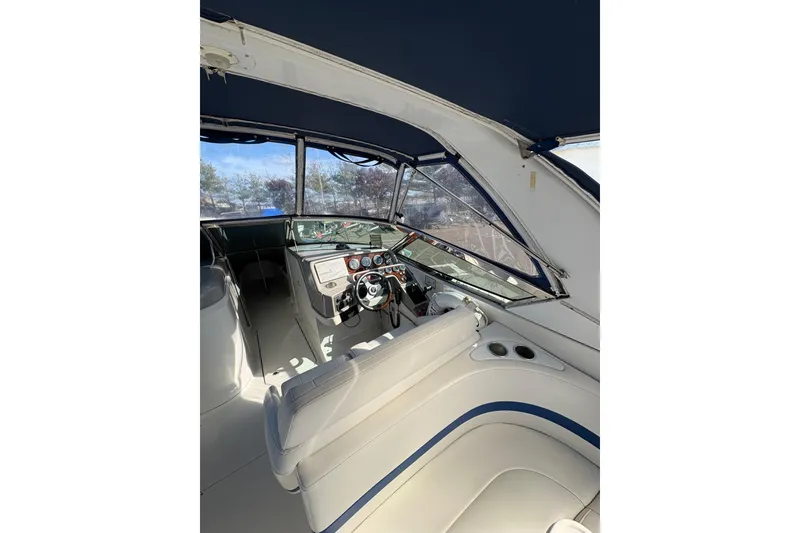 Slide: The Image of Interior view of 2003 Formula 280 Bowrider boat with steering wheel and seating. - 61