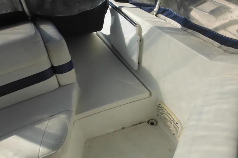 Slide: The Image of 2003 Formula 280 Bowrider interior with white seating and speaker detail. - 8