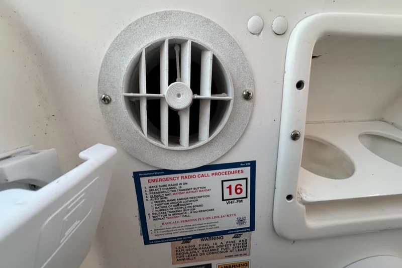 Slide: The Image of Electrical control panel on a 2000 Tiara 37 Open boat, featuring DC and AC systems. - 102