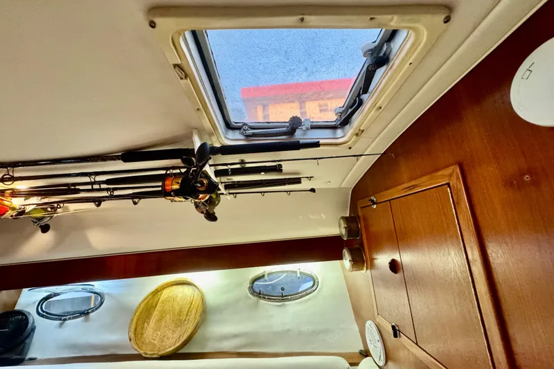 Slide: The Image of Compact bathroom in 2000 Tiara 37 Open yacht with skylight and shower. - 46