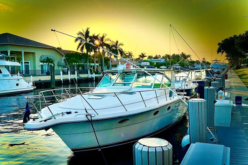 Slide: The Image of Control panel of a 2000 Tiara 37 Open boat with Garmin navigation systems. - 66